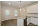 Kitchen with granite island and back door at 469 Oates St, Rock Hill, SC 29730