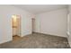 Spacious bedroom with carpeting and access to a private bathroom at 469 Oates St, Rock Hill, SC 29730
