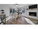 Bright dining area with fireplace and view to backyard at 6728 Rocky Falls Rd, Charlotte, NC 28211