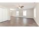Bright living room with hardwood floors and ceiling fan at 714 Knots Lndg, Clover, SC 29710