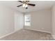 Spacious bedroom with neutral carpeting and double door closet at 714 Knots Lndg, Clover, SC 29710