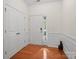 Bright entry with hardwood floors, white walls, and double closets at 8509 Loxton Cir, Charlotte, NC 28214