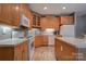 Well-equipped kitchen with island and stainless steel appliances at 101 Hidden Cove Dr, Shelby, NC 28150