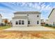 Two-story house with a large patio and fenced backyard at 1707 Scarbrough Sw Cir, Concord, NC 28025