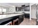 Spacious kitchen with dark cabinets and granite countertops at 1707 Scarbrough Sw Cir, Concord, NC 28025