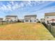 Spacious backyard with grassy area and fence at 1707 Scarbrough Sw Cir, Concord, NC 28025