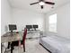 Bedroom with a desk, two computers, and a bed at 1707 Scarbrough Sw Cir, Concord, NC 28025