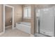 Bathroom featuring a jetted tub and a separate shower at 412 Autumnlight Dr, Salisbury, NC 28147