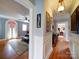 Hallway with hardwood floors and access to bedrooms at 1116 E Franklin Blvd, Gastonia, NC 28054