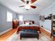 Comfortable bedroom featuring hardwood floors and a large bed at 1116 E Franklin Blvd, Gastonia, NC 28054