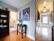 Clean bathroom with white fixtures and hardwood floors at 1116 E Franklin Blvd, Gastonia, NC 28054