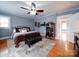 Bright bedroom with hardwood floors and a king-size bed at 1116 E Franklin Blvd, Gastonia, NC 28054