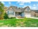 Two-story home with stone and siding exterior at 1150 Hearth Sw Ln, Concord, NC 28025