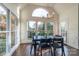 Bright breakfast nook with a table and chairs, overlooking backyard at 17418 Sailors Watch Pl, Cornelius, NC 28031