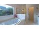 Spa-like bathroom with soaking tub and walk-in shower at 17418 Sailors Watch Pl, Cornelius, NC 28031