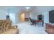 Bonus room features a large desk, TV, and comfortable seating area at 17418 Sailors Watch Pl, Cornelius, NC 28031