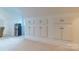 Bonus room with ample built-in storage cabinets at 17418 Sailors Watch Pl, Cornelius, NC 28031