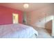 Bedroom with pink wall, ample closet space at 17418 Sailors Watch Pl, Cornelius, NC 28031