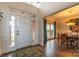 Bright two story entryway with hardwood floors and formal dining room at 17418 Sailors Watch Pl, Cornelius, NC 28031