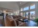Open Gathering room with large windows and access to deck at 17418 Sailors Watch Pl, Cornelius, NC 28031