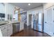 Modern kitchen with stainless steel appliances and hardwood floors at 17418 Sailors Watch Pl, Cornelius, NC 28031
