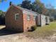 Brick and stone house exterior with yard at 223 Chester Ave, Great Falls, SC 29055