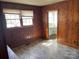 Small bathroom with wood walls and a sink at 223 Chester Ave, Great Falls, SC 29055