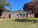 Brick ranch house with a covered porch and large yard at 223 Chester Ave, Great Falls, SC 29055