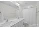 Clean bathroom with double vanity, large mirror, and a shower/tub combo at 122 W Heart Pine Ln, Statesville, NC 28677