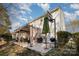 Spacious backyard patio with pergola, seating area, and grill at 12413 Stowe Acres Dr, Charlotte, NC 28262