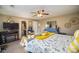 Spacious bedroom with a king-size bed, fireplace, and en-suite bathroom at 12413 Stowe Acres Dr, Charlotte, NC 28262