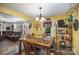 Cozy dining area with a wooden table and seating for four at 12413 Stowe Acres Dr, Charlotte, NC 28262