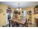 Bright kitchen with an island, stainless steel appliances, and ample cabinet space at 12413 Stowe Acres Dr, Charlotte, NC 28262