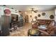 Living room with sectional sofa, hardwood floors, and a fireplace at 12413 Stowe Acres Dr, Charlotte, NC 28262