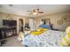 Spacious bedroom with a king-size bed, fireplace, and en-suite bathroom at 12413 Stowe Acres Dr, Charlotte, NC 28262