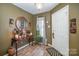 Bright entryway with hardwood floors and decorative accents at 12413 Stowe Acres Dr, Charlotte, NC 28262