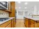 Open kitchen with gas range and hardwood flooring at 151 Heywatchis Dr, Mooresville, NC 28115