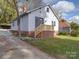 Charming house with gray siding and brick steps at 440 Cherry St, Wadesboro, NC 28170