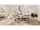Bright dining area with a round table and four chairs, near the kitchen at 9000 Boyd Dr, Matthews, NC 28105