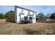 Two-story house with white siding and deck at 9000 Boyd Dr, Matthews, NC 28105