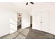 Bedroom with hardwood floors, double door closet, and en-suite bathroom access at 9000 Boyd Dr, Matthews, NC 28105