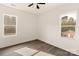Bright bedroom with hardwood floors and two large windows at 9000 Boyd Dr, Matthews, NC 28105