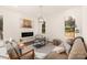 Modern living room features a fireplace and access to the back deck at 9000 Boyd Dr, Matthews, NC 28105