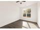 Spacious bedroom with large window, hardwood floors and neutral colors at 9000 Boyd Dr, Matthews, NC 28105