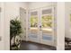 Bright entryway with double doors and dark hardwood floors at 9000 Boyd Dr, Matthews, NC 28105