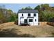 Two-story house with backyard and wooden privacy fence at 9000 Boyd Dr, Matthews, NC 28105