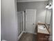 Bathroom includes a shower, toilet and vanity at 129 Burning Ln, Stony Point, NC 28678