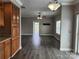 Open living room with dark laminate flooring and access to a deck at 129 Burning Ln, Stony Point, NC 28678
