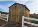 Wooden storage shed with ramp access at 129 Burning Ln, Stony Point, NC 28678