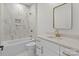 Clean bathroom with white vanity, marble tile, and gold fixtures at 2410 Brantley Rd, Kannapolis, NC 28083